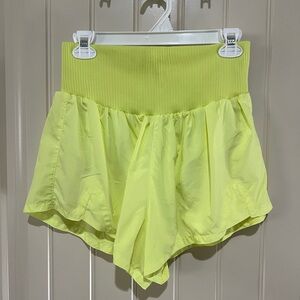 FP Movement neon yellow Carpe Diem shorts